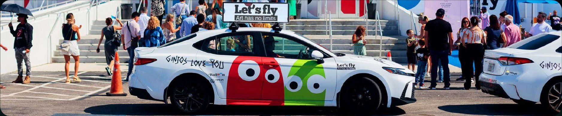 Firefly-equipped car at a street event